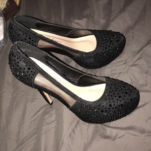 Platform high heels. Only worn once to my prom.